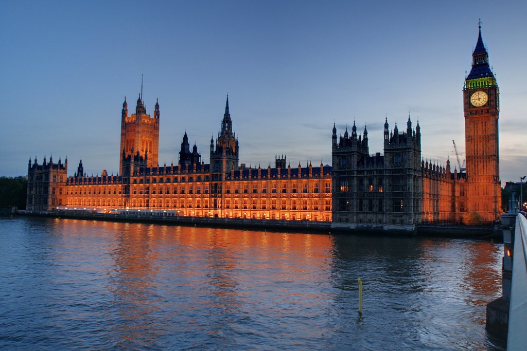 Image of Westminster Parliament at night, a view from across the river.