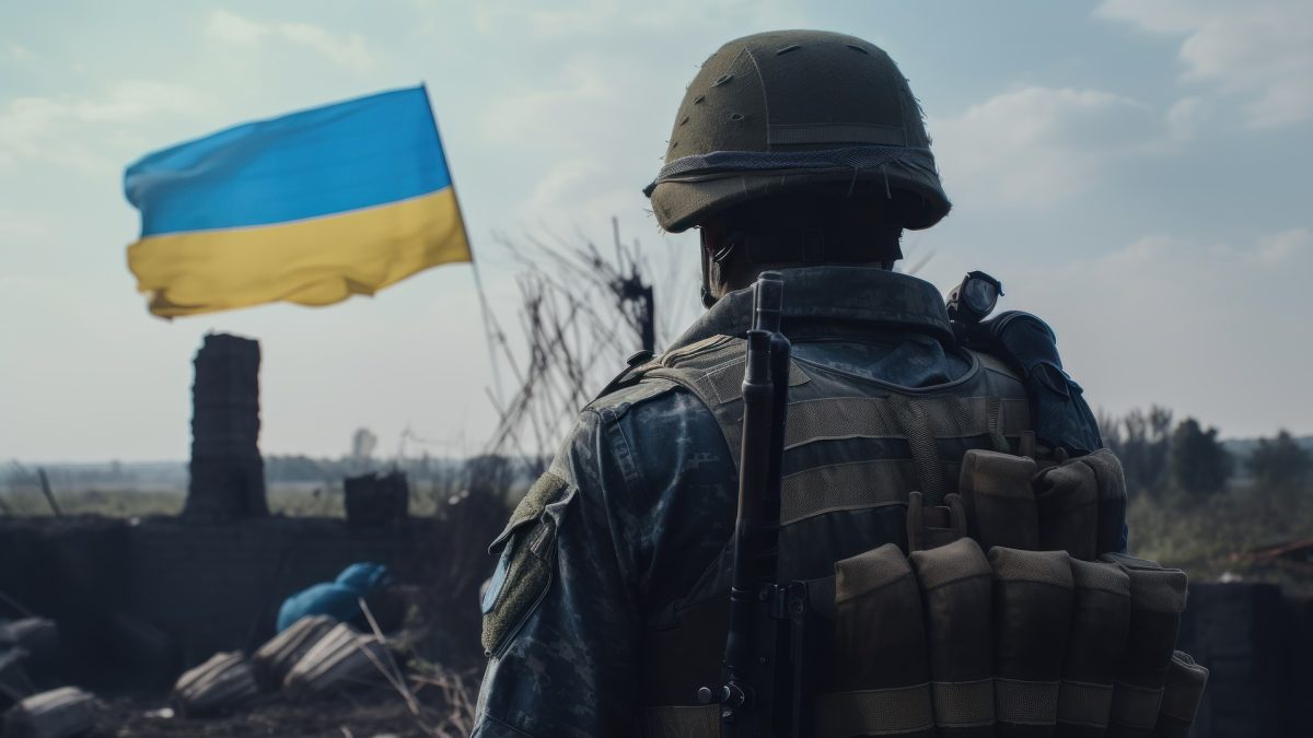 A Ukrainian soldier and flag