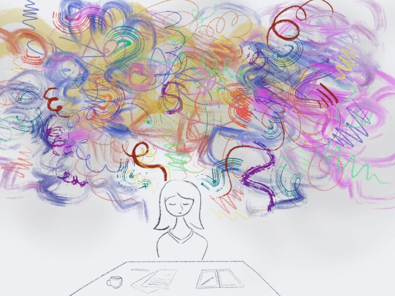 A student sitting at their desk on a white background. Above them are colourful swirls representing their thoughts and distractions.