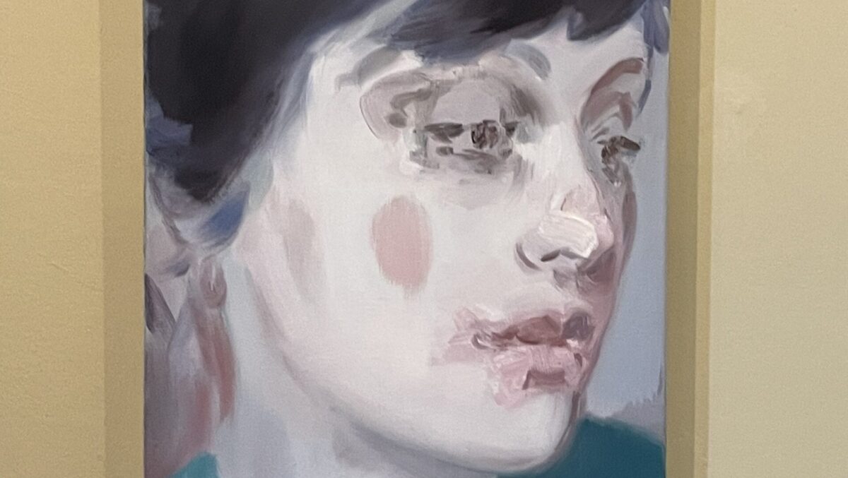 A painting of a woman's face, facing right, from Kaye Donachie's exhibit at the Pallant House Gallery.