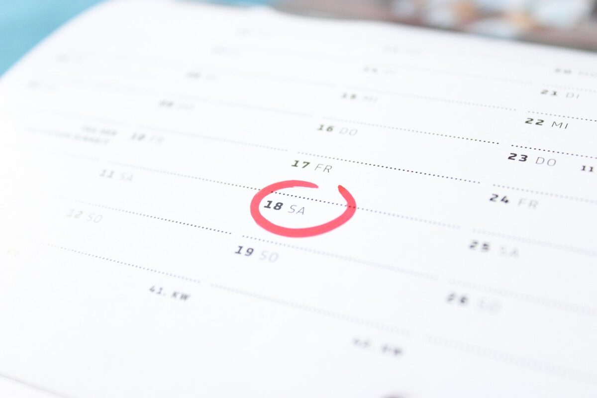 An image of a calendar, with a date circled in red.