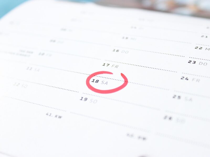 An image of a calendar, with a date circled in red.