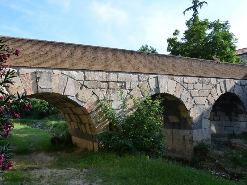An image of a Roman bridge over the Rubicon river