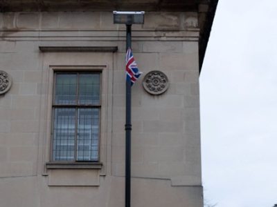 A flag erected on a lamp post in Oxford