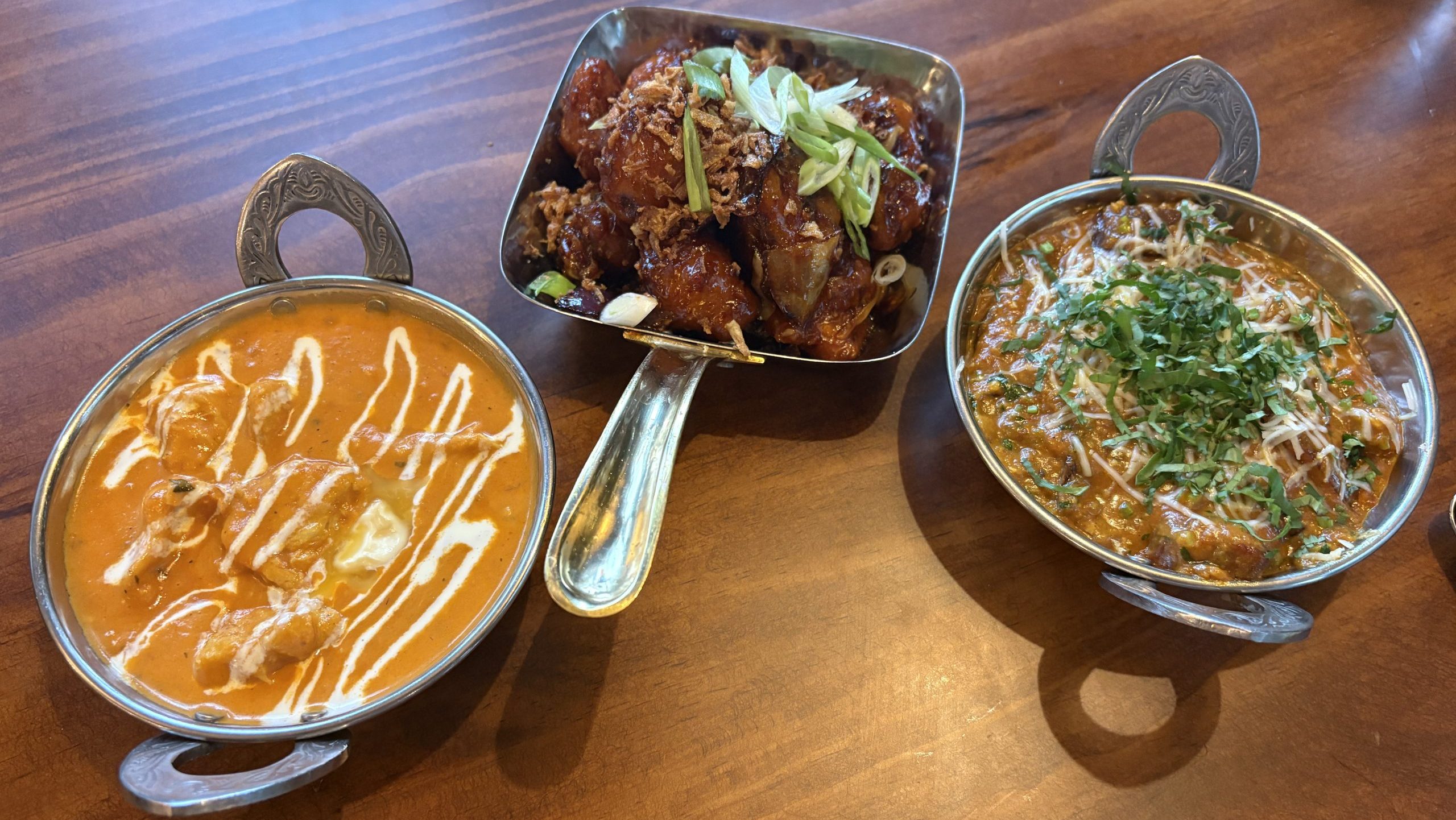 An image featuring various different dishes available at namaste village.