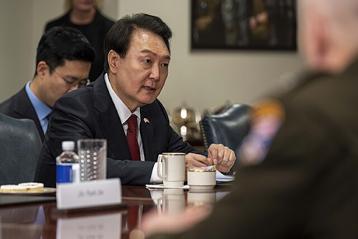 Former President Yoon at the White House in 2023, meeting Secretary of Defence Lloyd Bentsen.