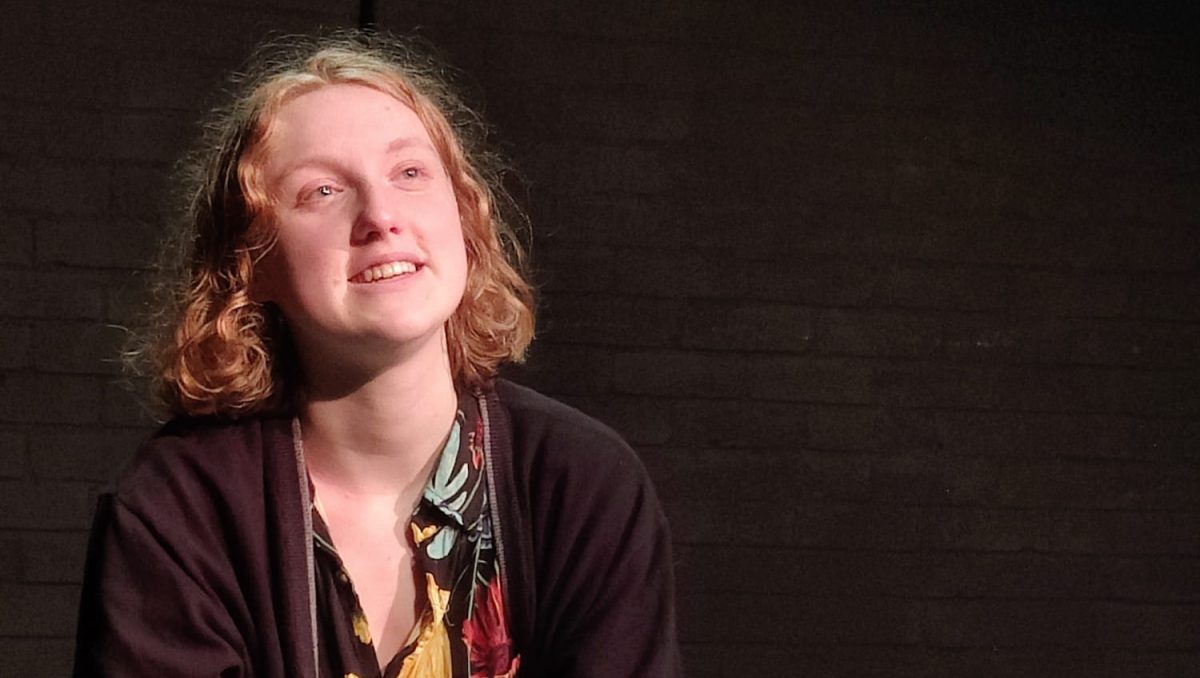 A person looks up above them dreamily.