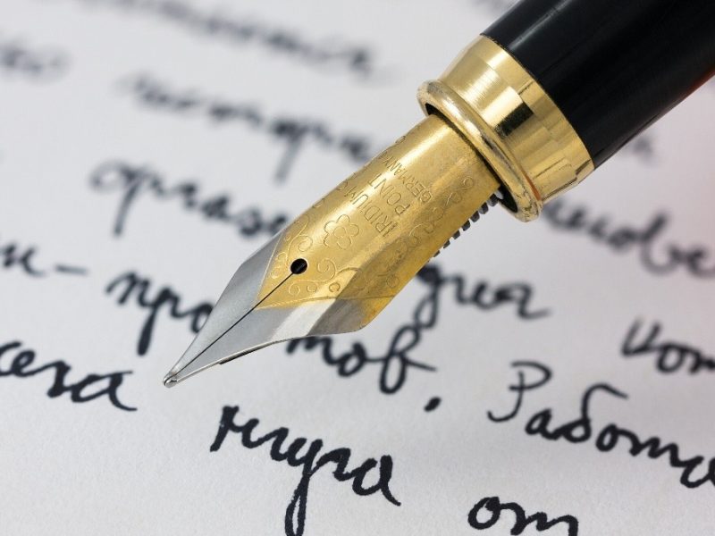 Pen writing on paper