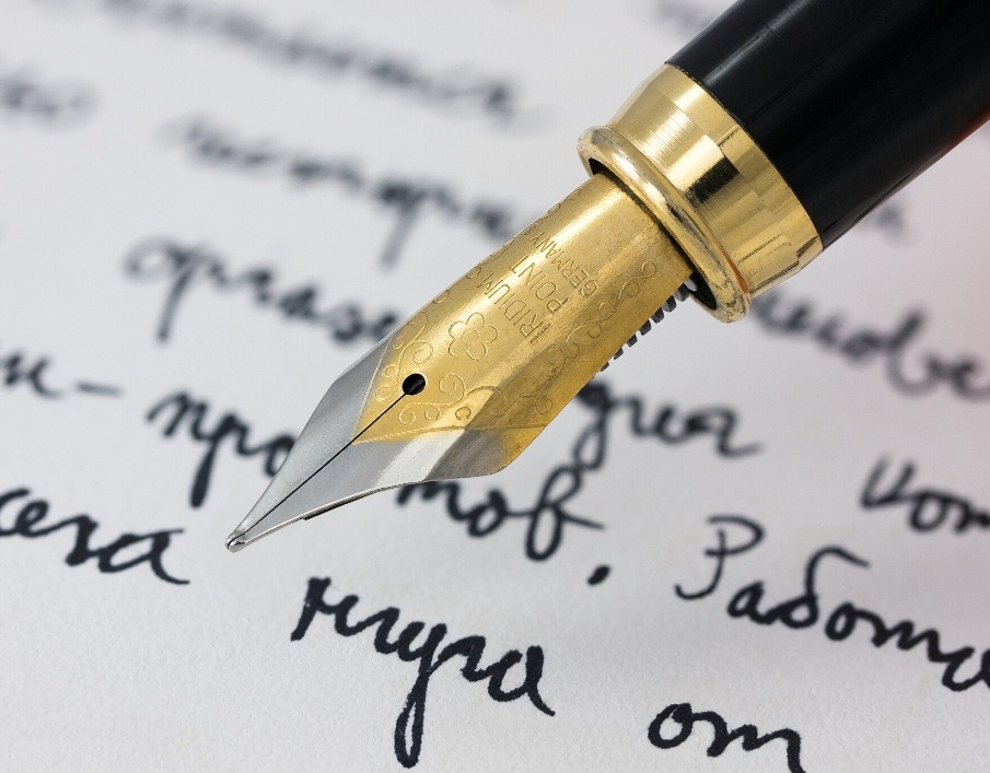 Pen writing on paper
