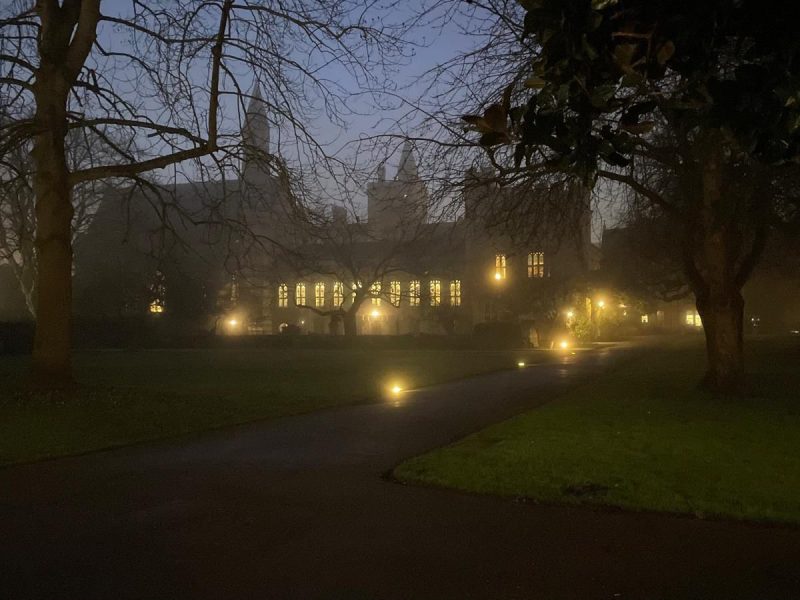 Photo of an Oxford College at dusk.