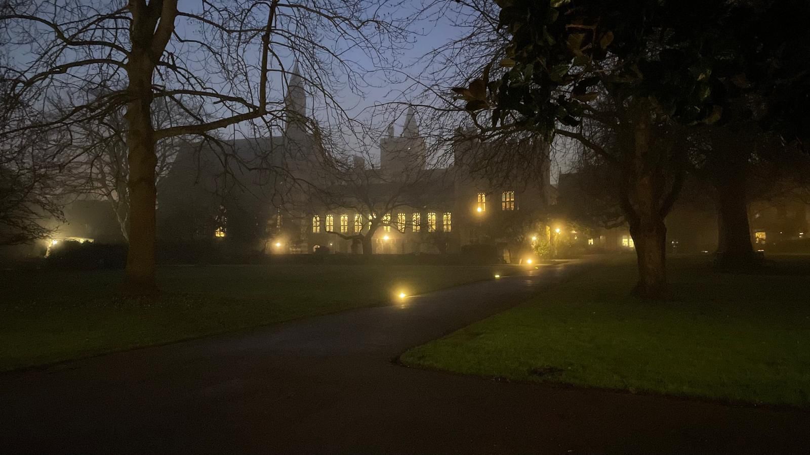 Photo of an Oxford College at dusk.