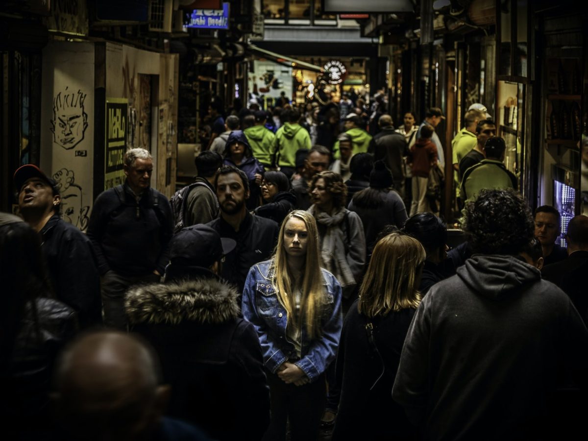 Credit: Mike Wilson. Lonely woman surrounded by many people, 23 July. 2016