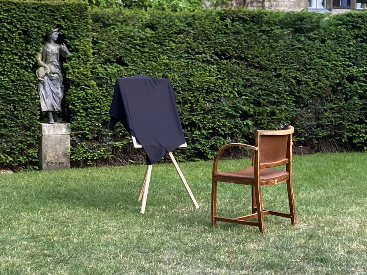 Basil's chair and covered portrait