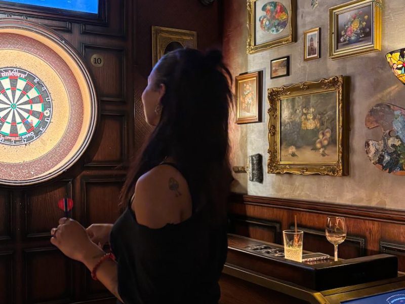 A person playing darts