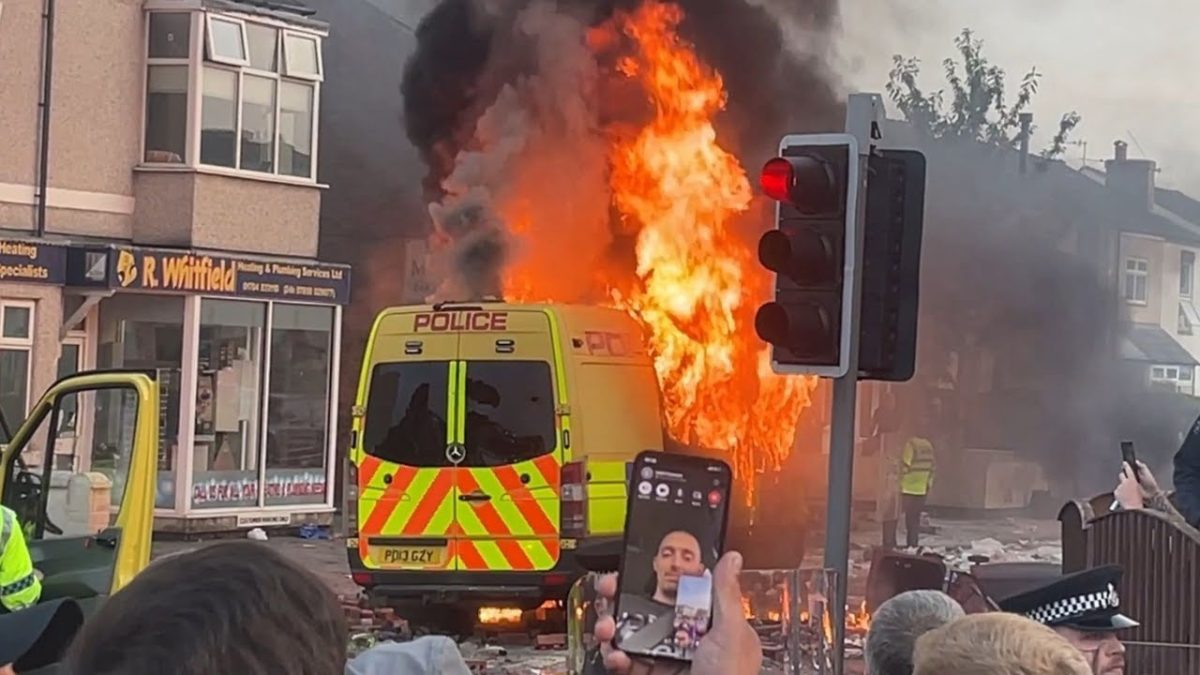 Van on fire during the 2024 Southport Riots