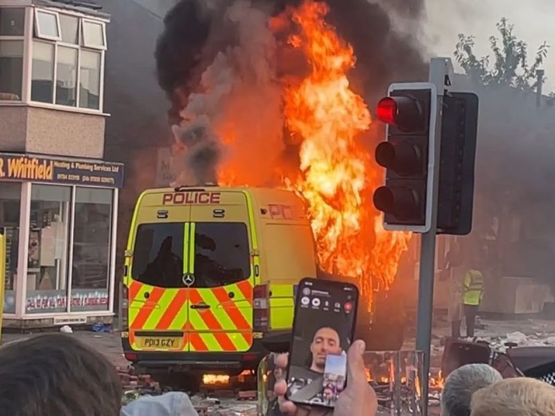 Van on fire during the 2024 Southport Riots