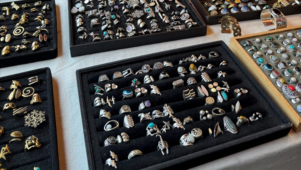 Many rings in display boxes for sale