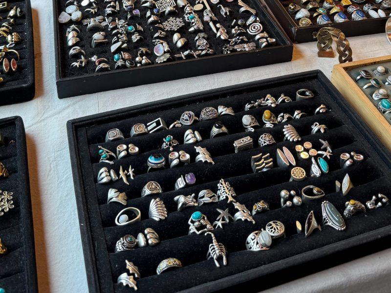 Many rings in display boxes for sale