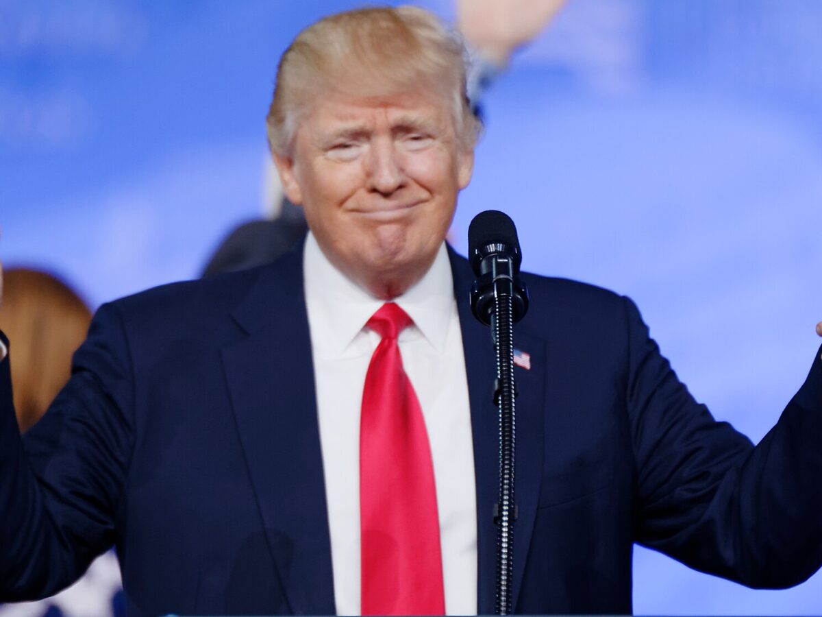 Donald Trump smiling, with his thumbs up.