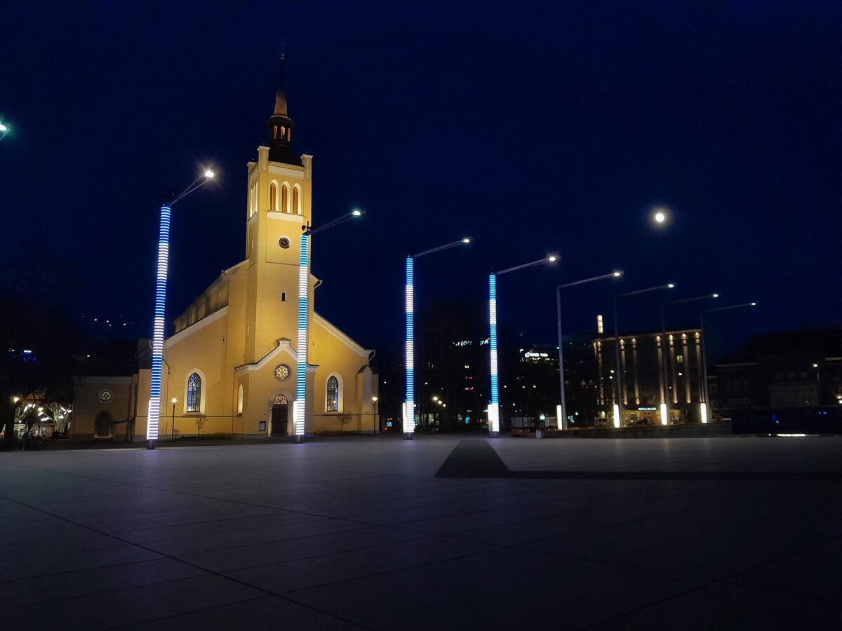 Photo of a church lit up at night