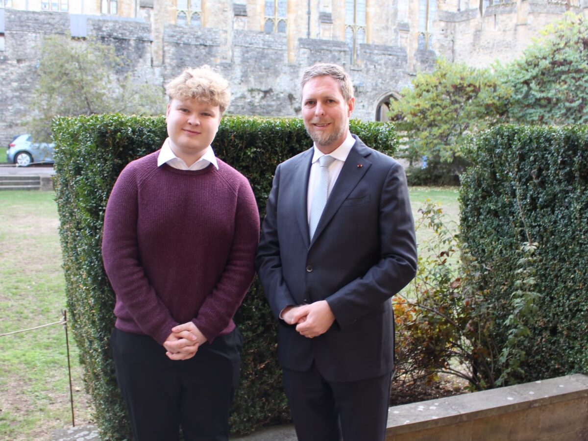 Editor-in-Chief Noah Allerton stood next to Leka II, Crown Prince of the Albanians, in New College.