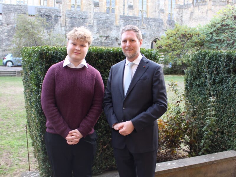 Editor-in-Chief Noah Allerton stood next to Leka II, Crown Prince of the Albanians, in New College.