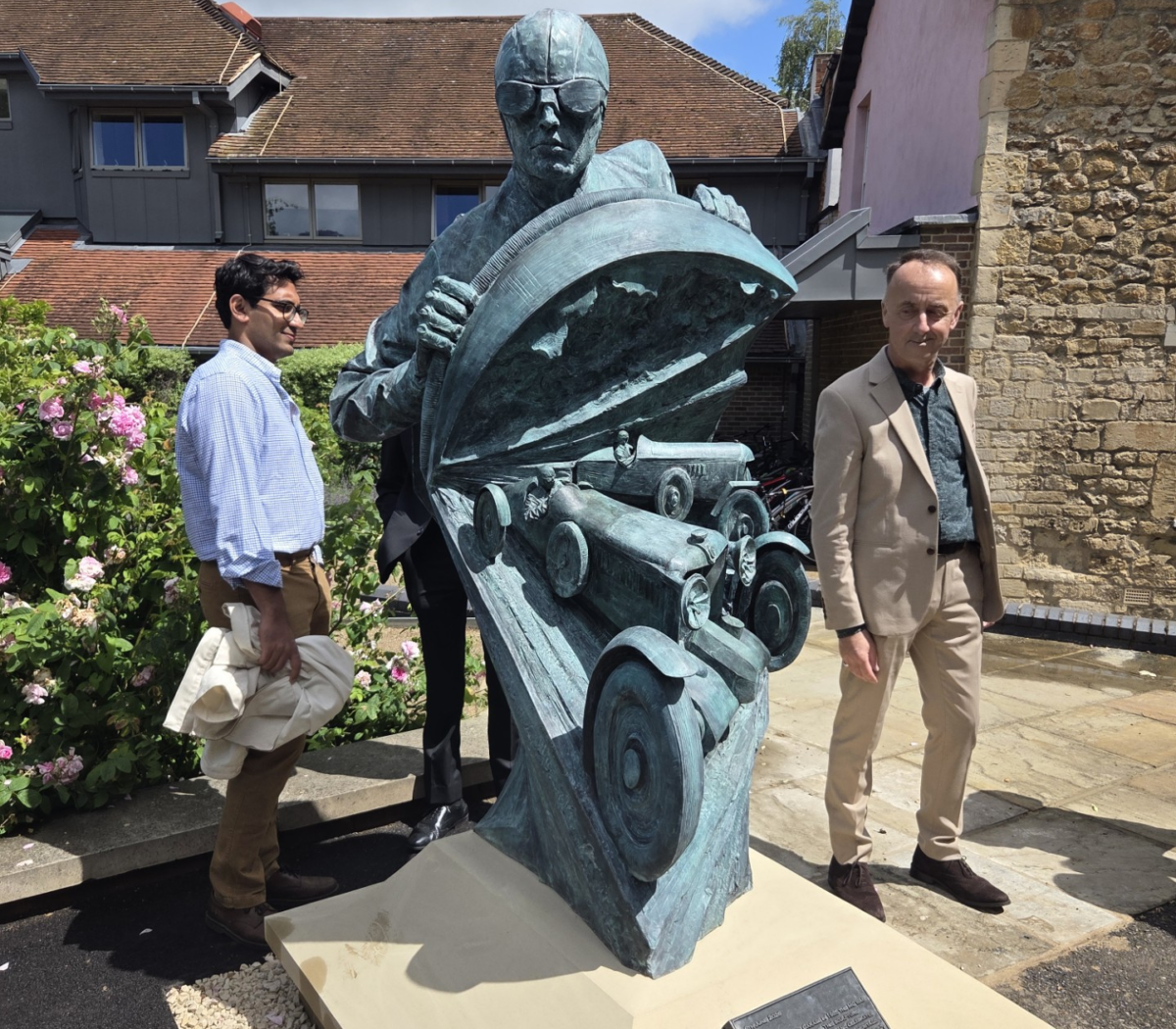 Paul Day's statue, depicting one MG racecar being overtaken by another