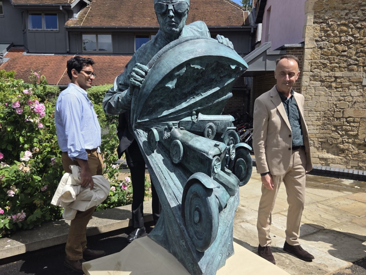 Paul Day's statue, depicting one MG racecar being overtaken by another