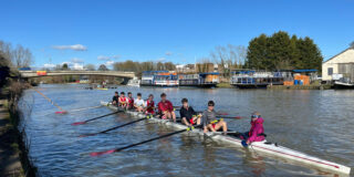 Exeter College's M1 crew on the river.