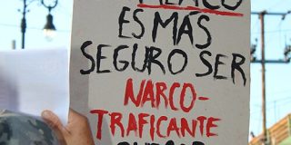 A poster during a protest in Mexico which says in Spanish: "In Mexico, it is safer to be a drug dealer than to be a student."