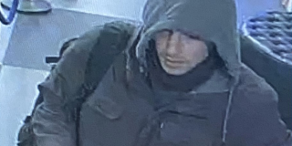CCTV photo released by the NYPD showing the suspect in the Brian Thompson killing at the HI New York City Hostel