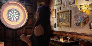 A person playing darts