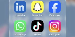 A screenshot of a home screen with social media apps on it.
