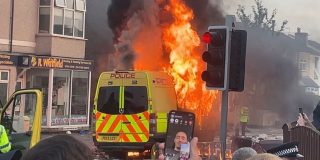 Van on fire during the 2024 Southport Riots