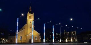 Photo of a church lit up at night