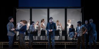 A snippet of "The Seagull" at the Oxford Playhouse, with all of the cast on a moody stage.